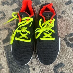 adidas Kids Black Sneakers with Neon Yellow Laces and Orange Trim